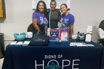 Signs of Hope staff and volunteers at events in LV